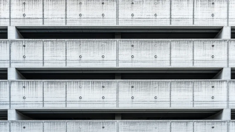 Architectural close-up of a concrete parking structure facade
